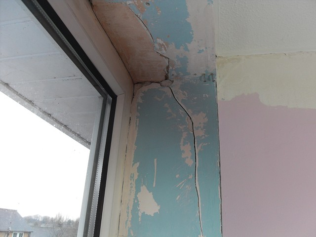 Cracks in the plaster due to historic settlement of the property.