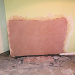 Fireplace made good with plastering in Alderley Edge