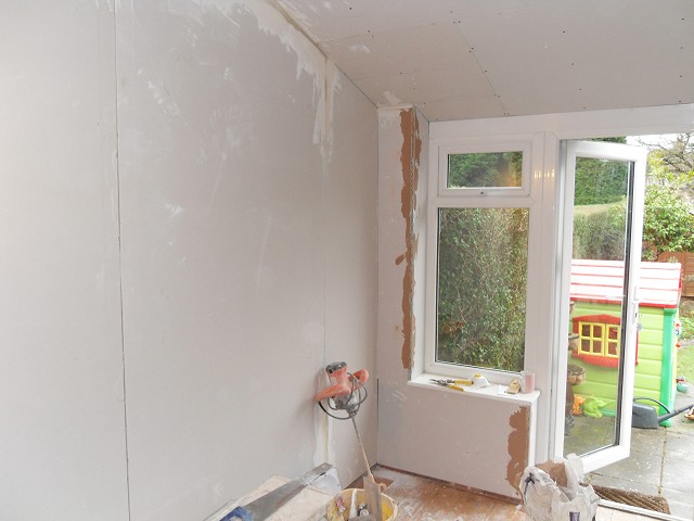 Dot 'n' dab plasterboard fixed to walls.